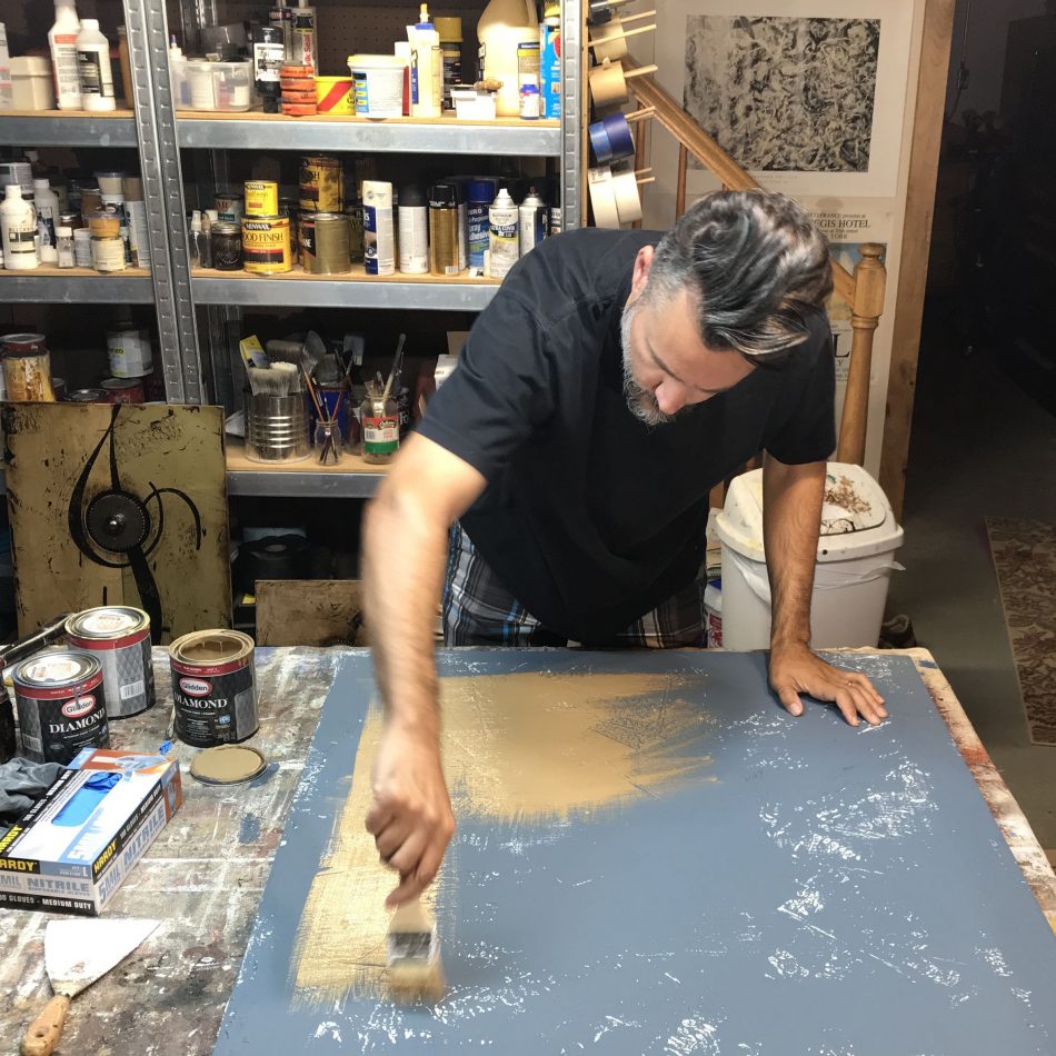 Artist Domenick Naccarato working in his home studio in Allentown, PA