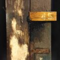 Remnants: Assemblage No. 9 | wood, plaster wrap, joint compound, tar, nails, screws, bracket, rust, stain, pencil, polyurethane, and paint | 16" x 12" x 2.5" | 2016