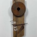 Remnants II: 8-13, Assemblage No. 1 | Apx. 14" x 6" x 2.5" | barn wood, paint, nails, copper wires, and a spur gear