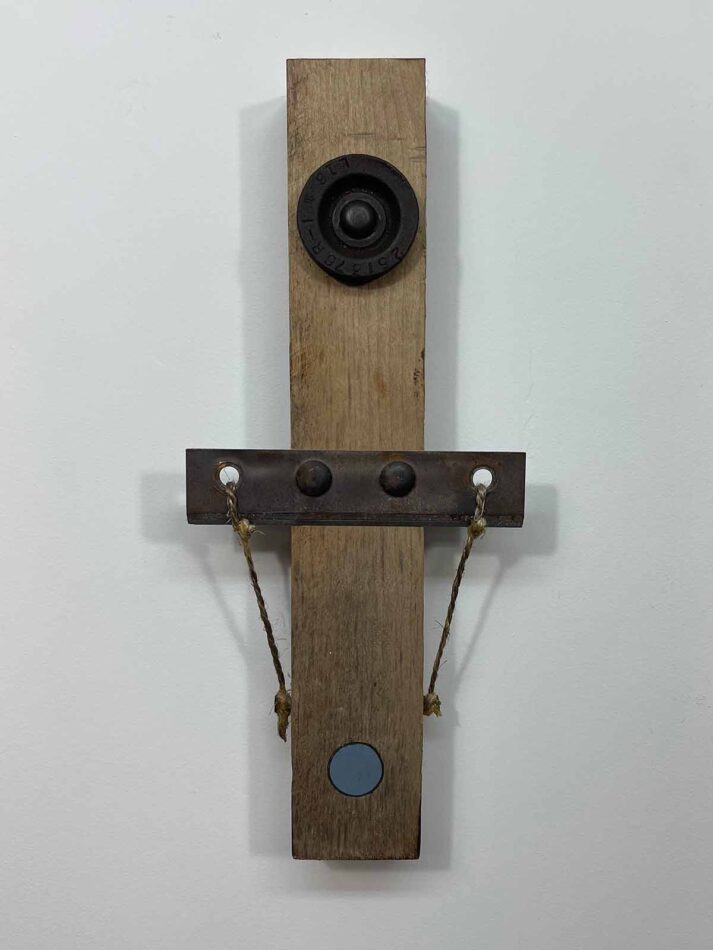 Remnants II: Assemblage No. 11 | Apx. 16”x6.5”x2.5” | Cutting knife, panhead bolts, bearing, screws, paint, epoxy, and twine on barn wood | 2018