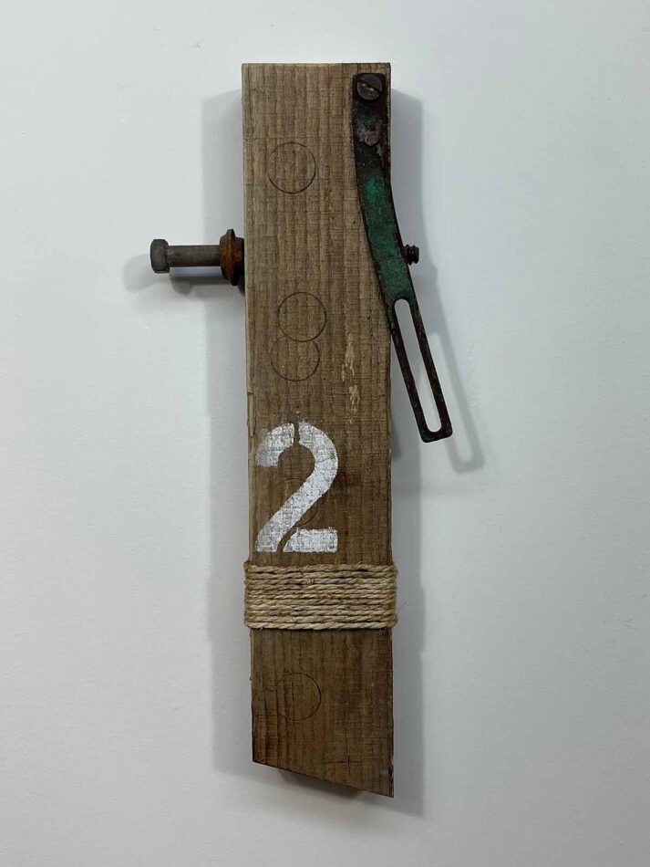Remnants II: Two, Assemblage No. 12 | Apx. 16”x7”x2.5” | Hex bolt, washer, bracket, screw, nail, twine, bracket, paint, and wood filler on barn wood | 2018