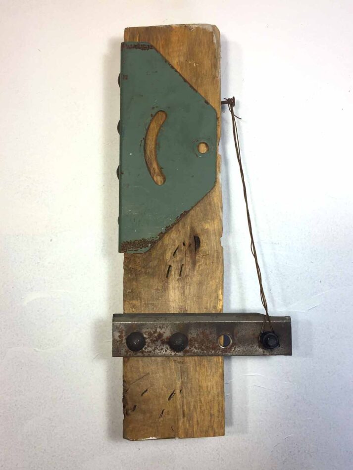 Remnants II: Assemblage No. 2 | Apx. 16" x 7" x 3" | barn wood, metal bracket, cutting knife, pan head bolts, copper wire, roofing nail, spray paint | 2017