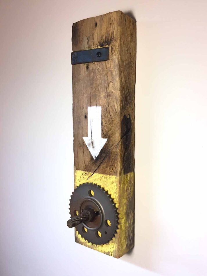 Remnants II: Assemblage No. 5 | Apx. 15” x 4” x 2” | barn wood, sprocket, machine screw, nut, washer, steel bracket, pan head screws, and paint | 2017